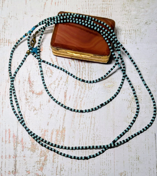 Long sautoir de Lola mixte.